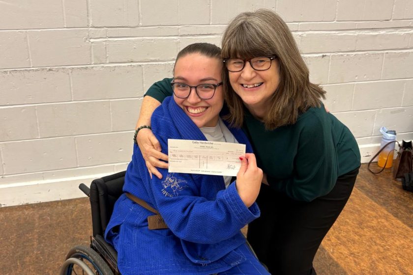 Sharon Berry presenting cheque to Isabelle Everest